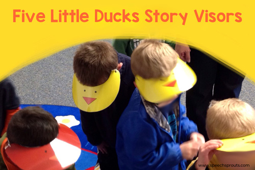 Children wearing yellow and brown visors as they act out the The Five Little Ducks Song. The visors are from speechsprouts.com