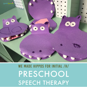 This purple constuction paper hippo craft with mini marshmallow teeth. A preschool speech therapy articulation activity for the initial H sound.